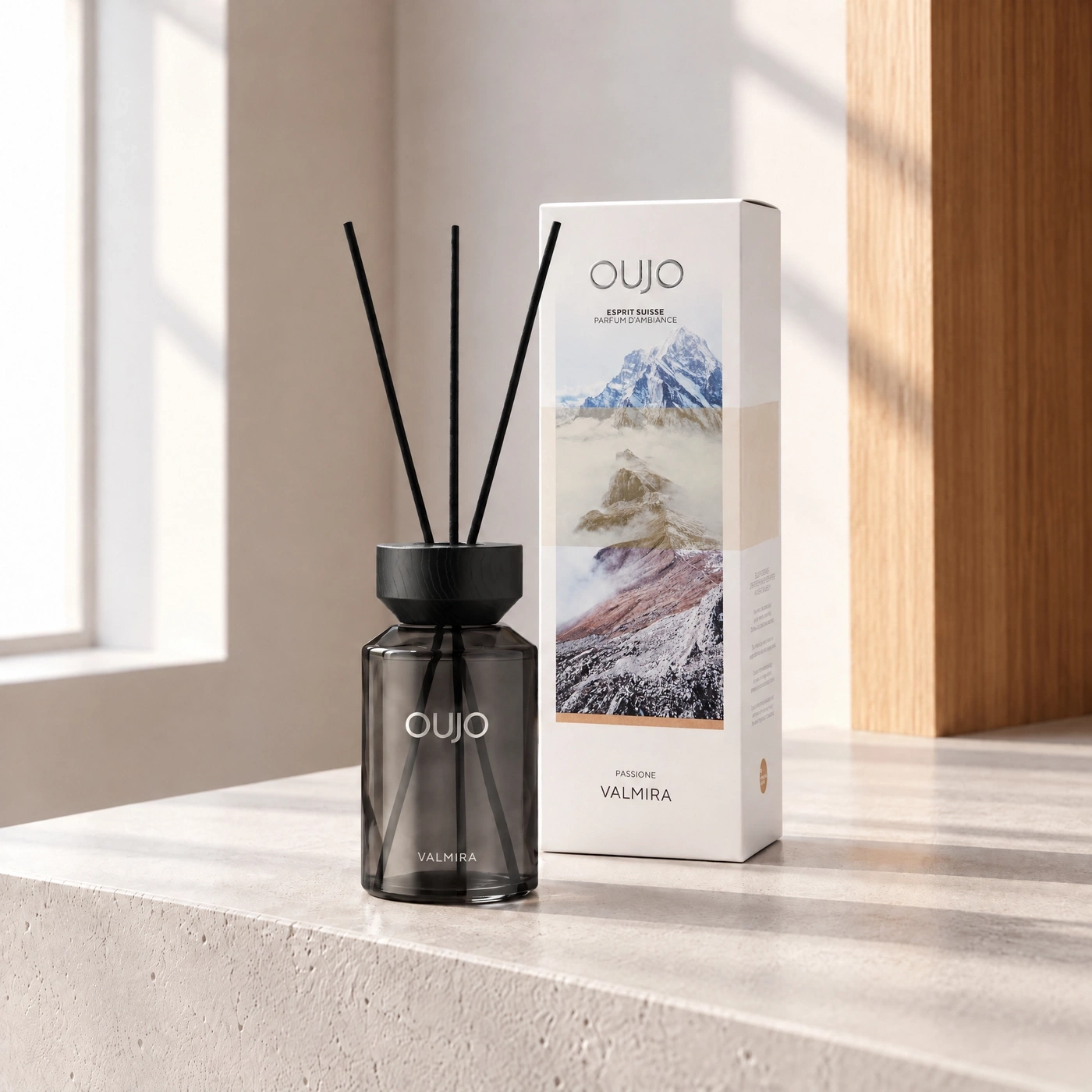 An Oujo diffuser with a mountain landscape on the packaging.