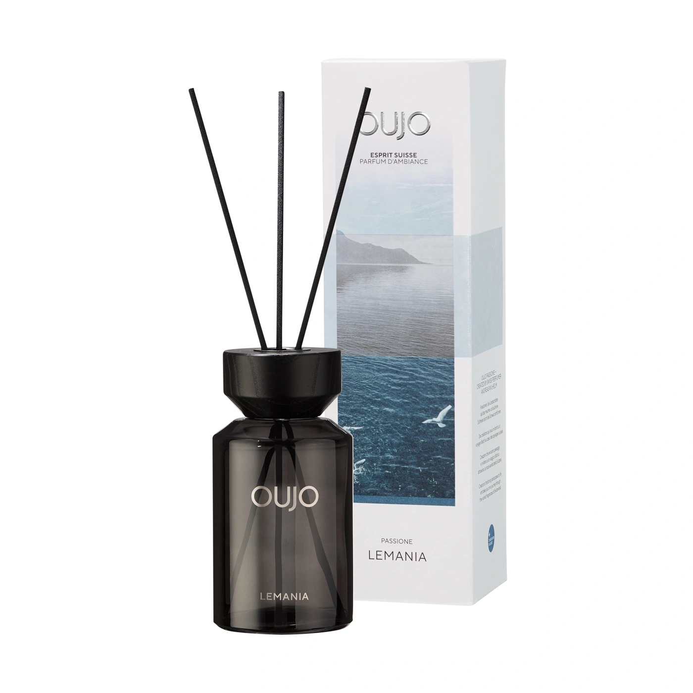 A diffuser with scent sticks and packaging.